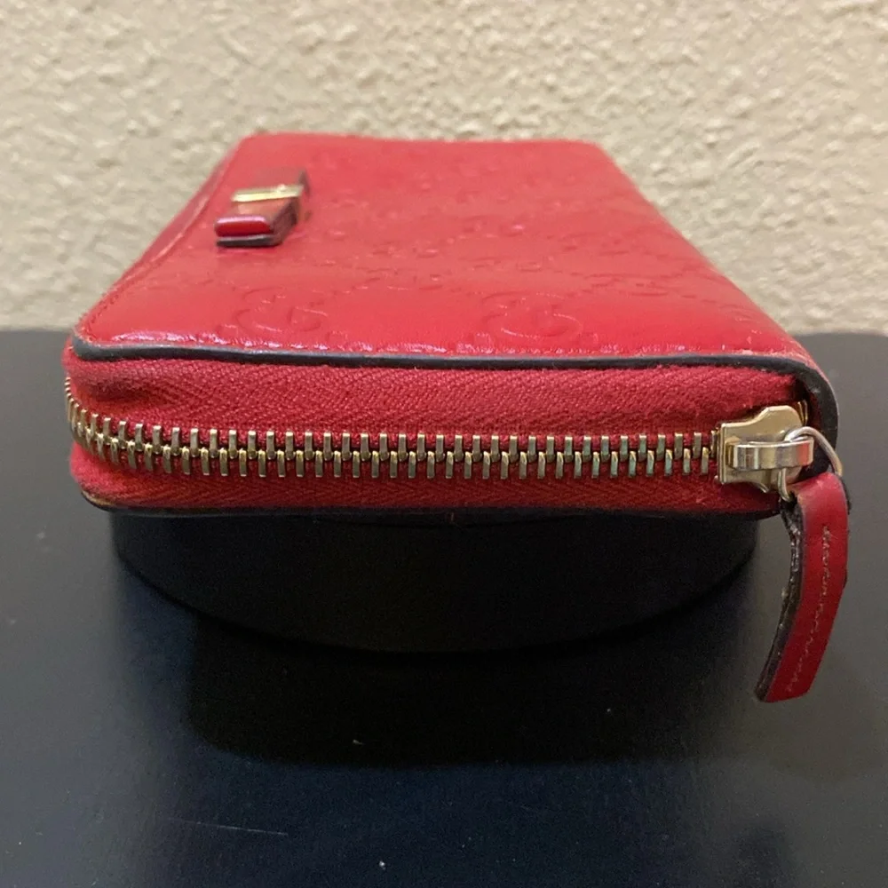 Beautiful red Gucci Guccissima bow zip wallet. β€οΈ - Picture 6 of 12